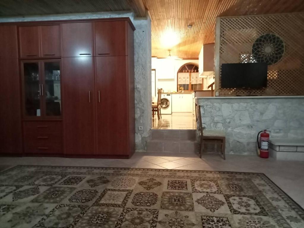 Detached stone house with access to a large garden near beach