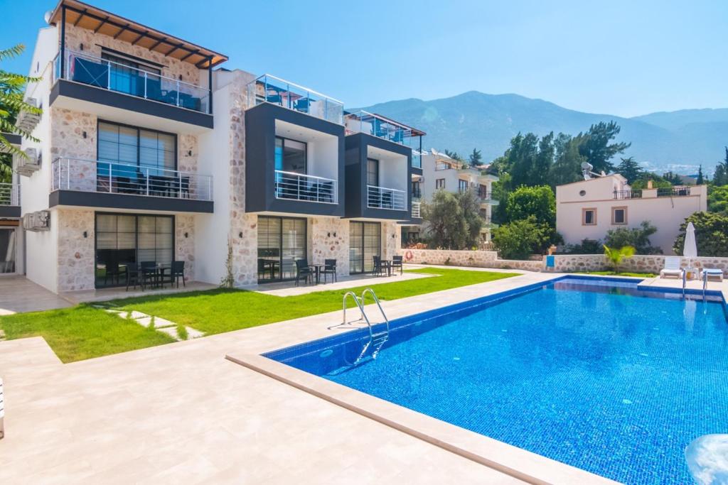 Stone House Aparts 1 plus 1 mit zwei Balkone und Poolblick Kalkan No 4
