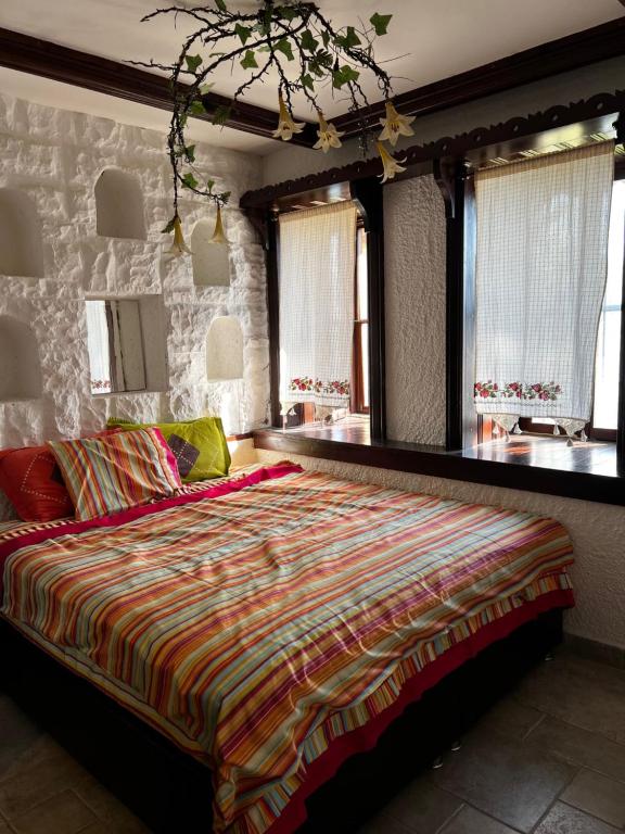 Escape to History in a Stunning Stone House with Garden and Sea View in the Heart of Alanya